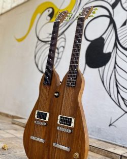 DESTAQUE: Msico de MT cria 'guitarra de cocho' com dois braos para homenagear cultura cuiabana